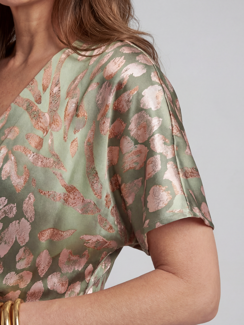 Coralie green abstract print midi dress with V-neck and twisted waist